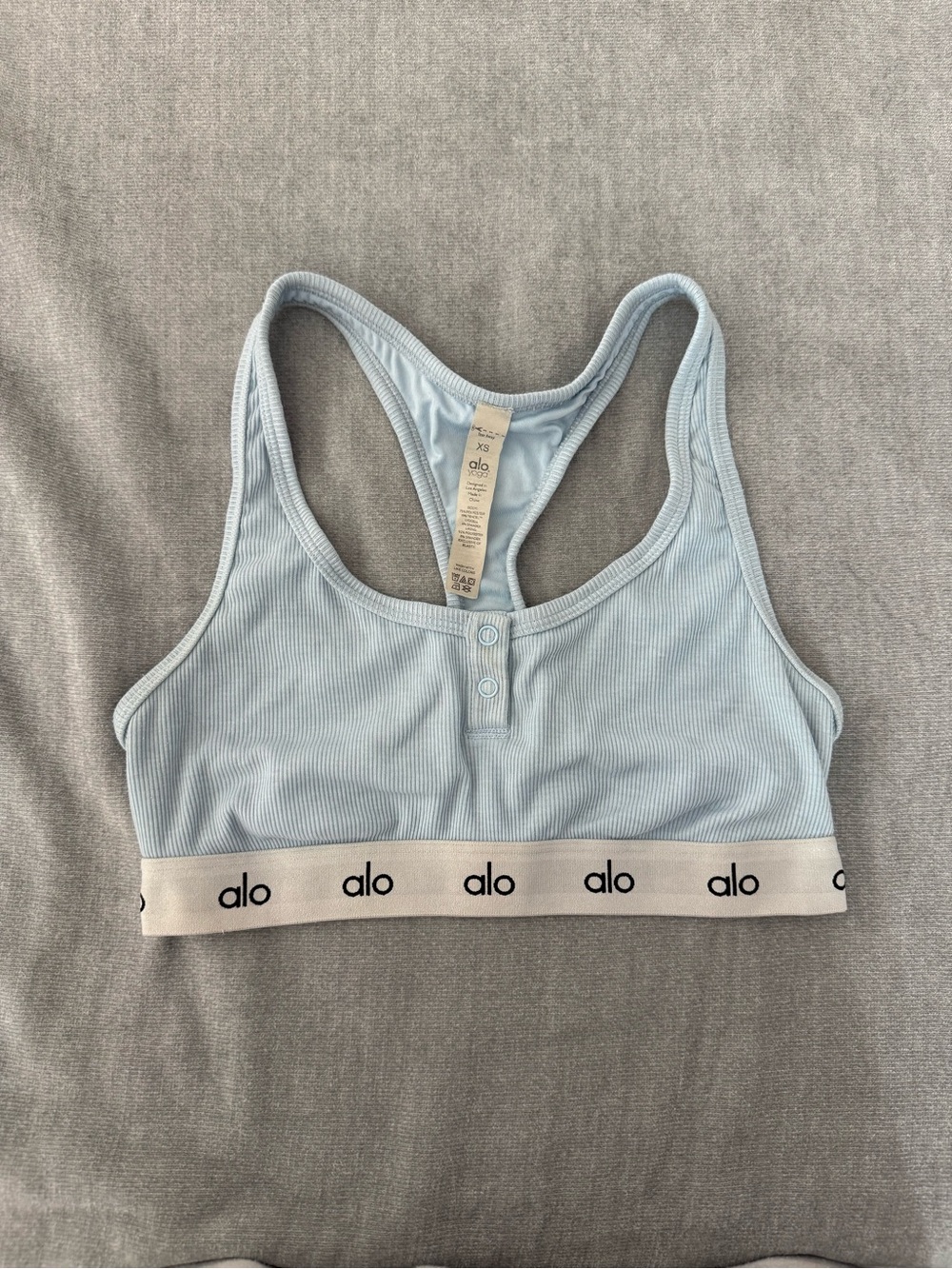 ALO Yoga Women's Light Blue Ribbed Racerback Bralette athletic icon ribbed